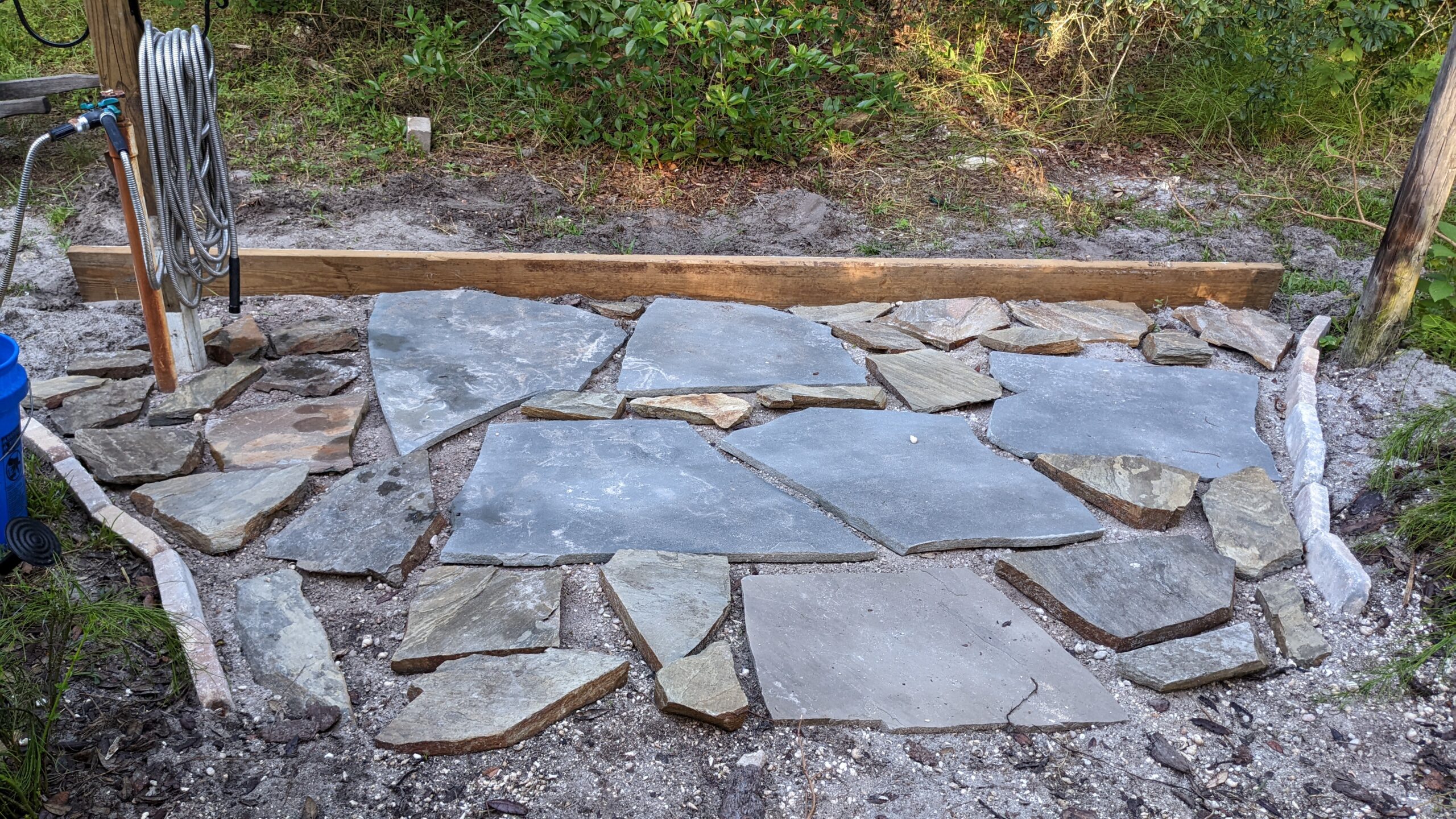 flagstone in position on transition apron