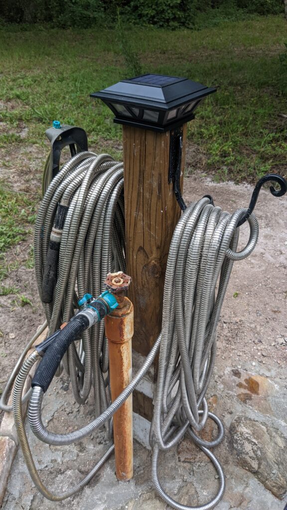 double bracket hose holder with solar post cap