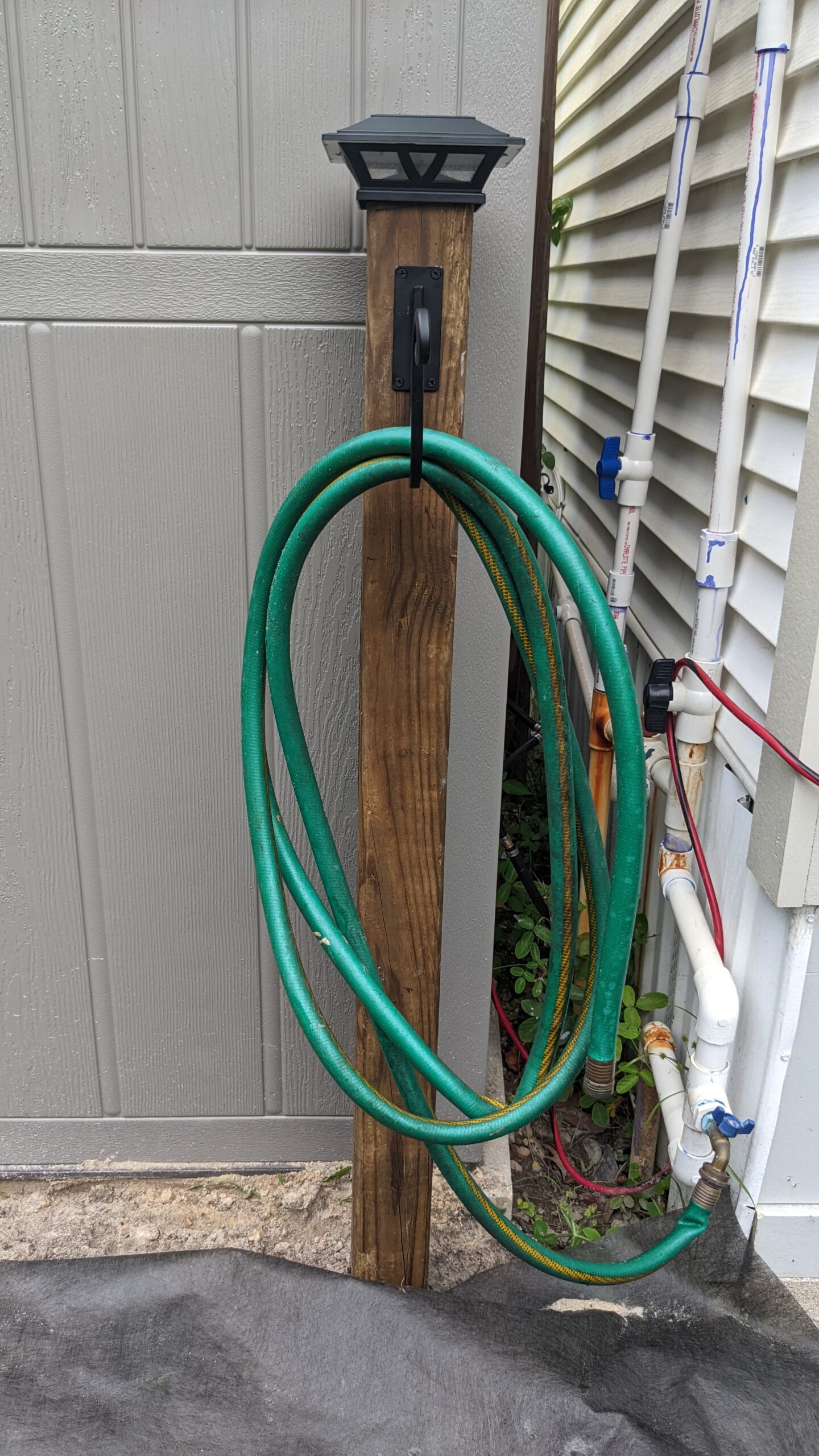 snazzied up 4x4 post hose holder