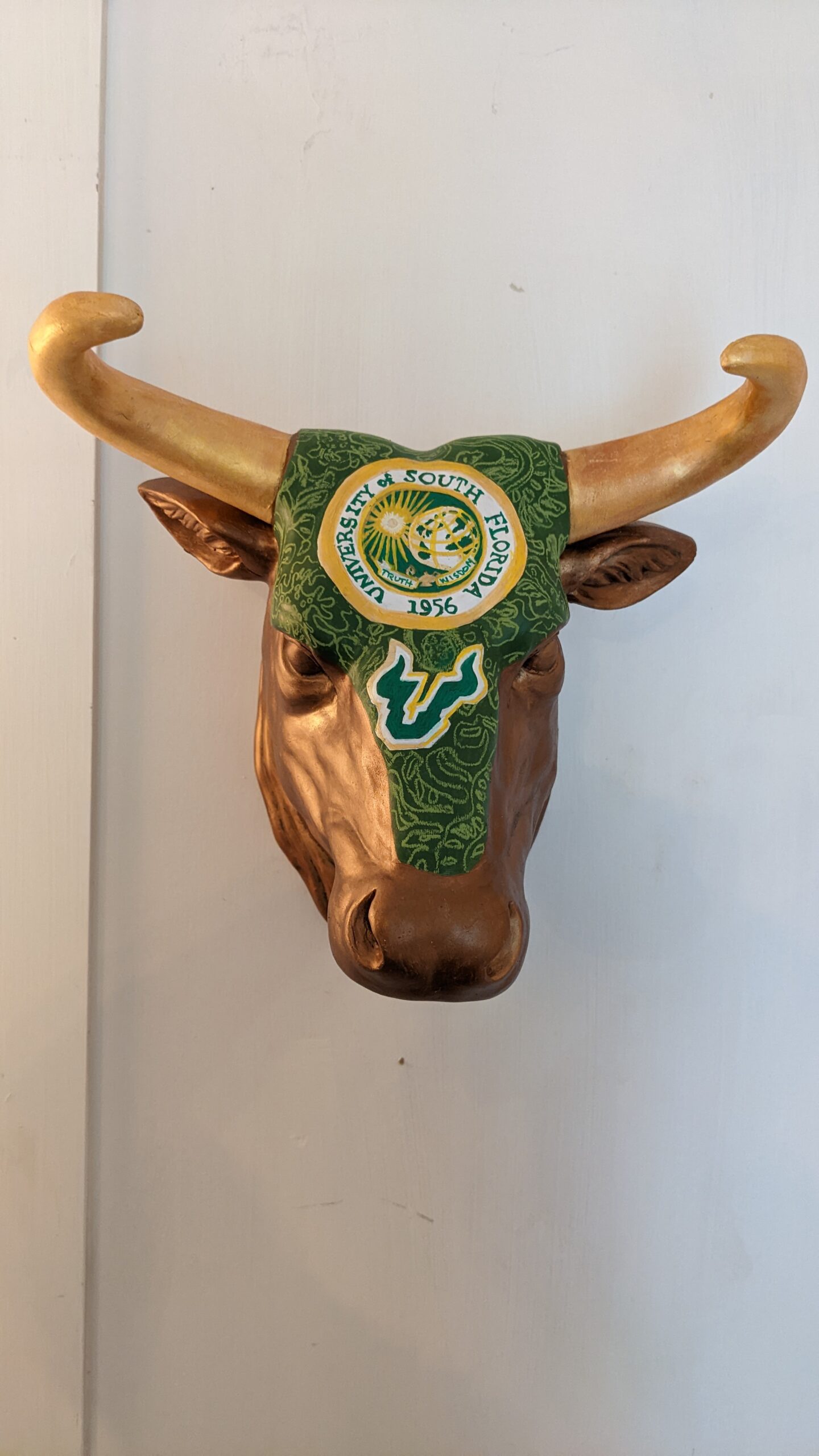 USF Bull Head painted with logos and brocade in mostly acrylic paint